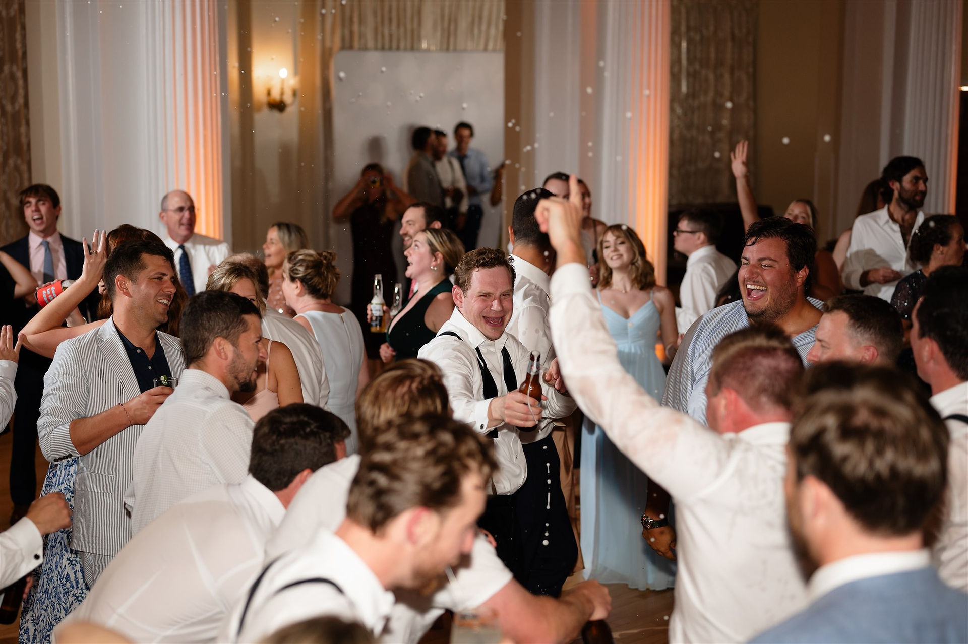 dance party during wedding reception in the grand ballroom at omni mount washington wedding