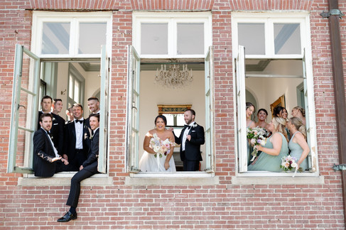 wedding party photo through windows