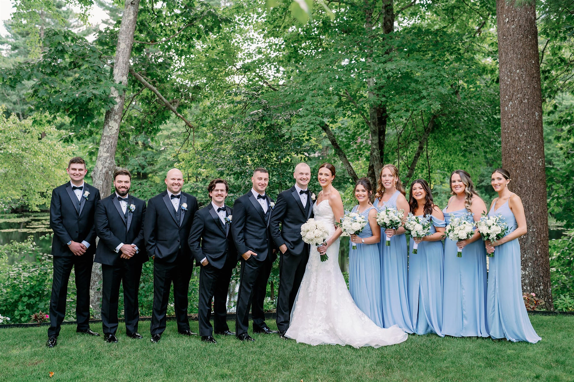wedding party portrait on side lawn of of lakeview pavillion