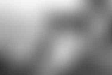 Black and white bridesmaids photo of girls walking in the wind