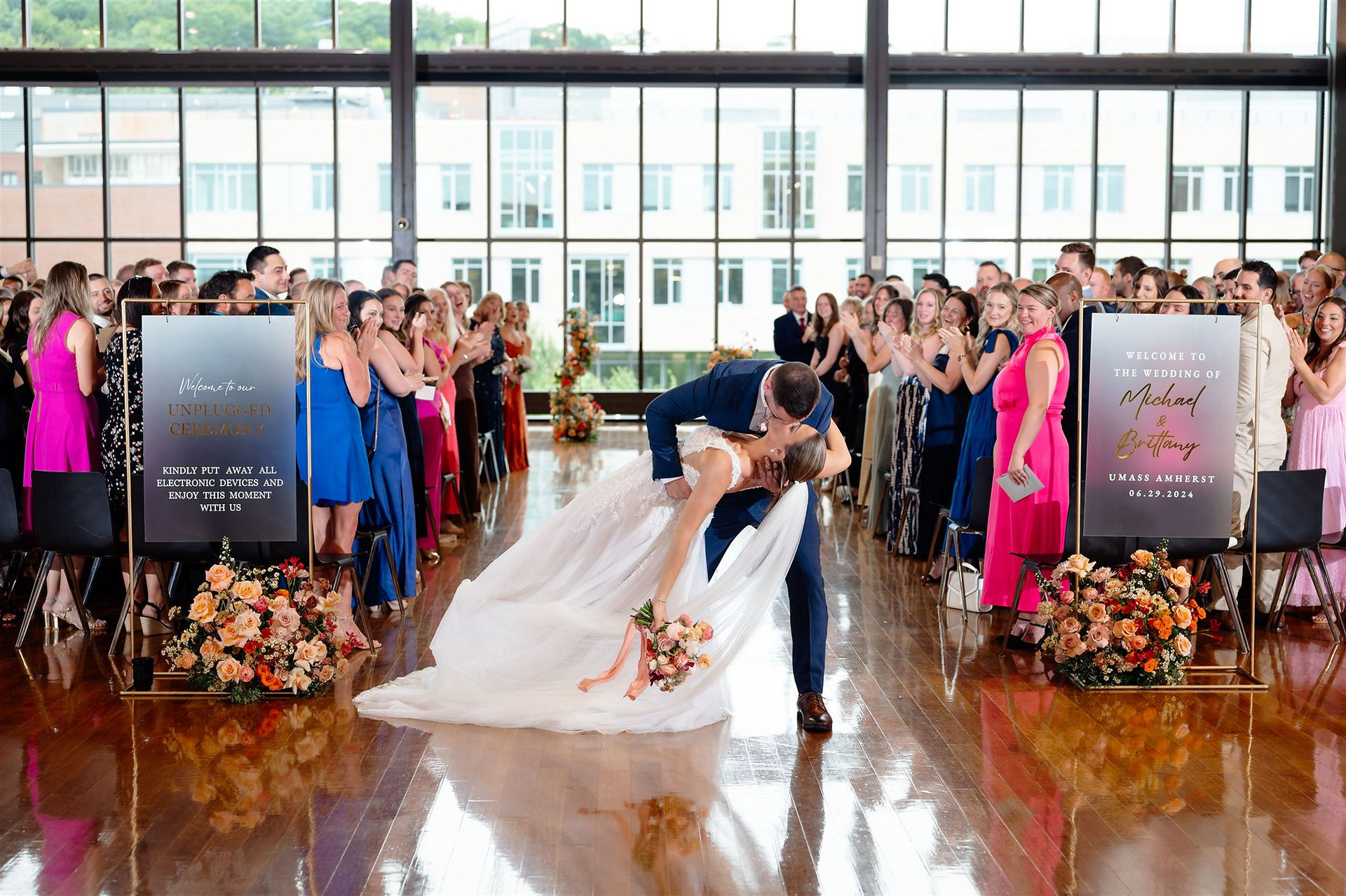 wedding aisle posed kiss 