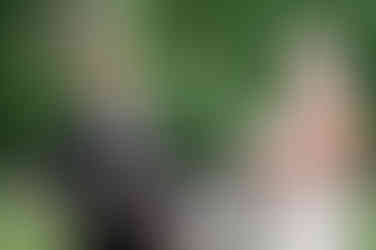 bride laughing listening to vows