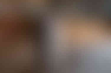 couple's first dance with big light up letters in background