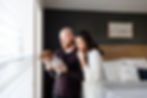 in home newborn session standing by window