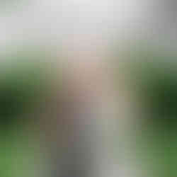 bride and mom with foreheads touching