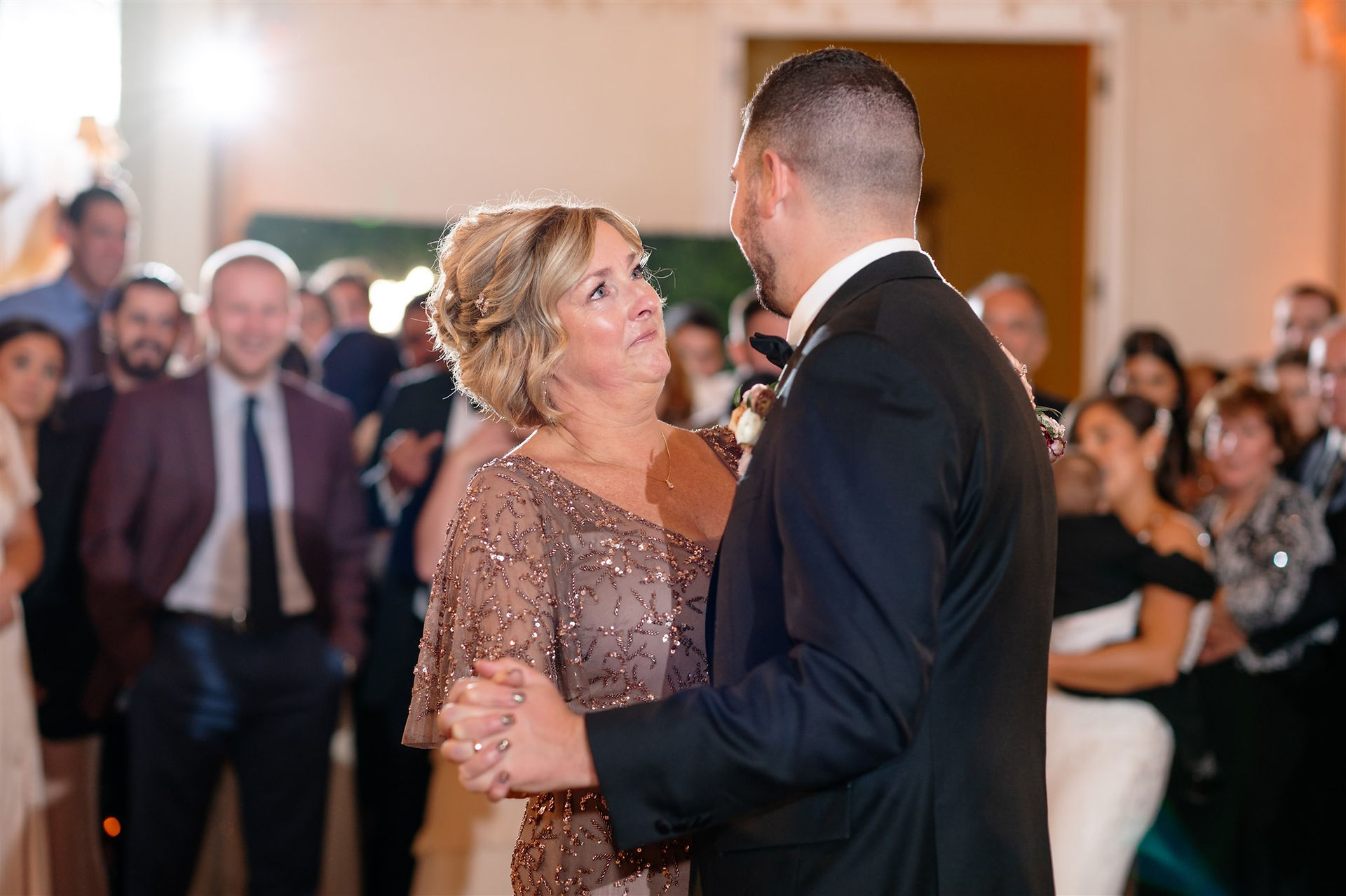 groom mother first dance during wedding reception