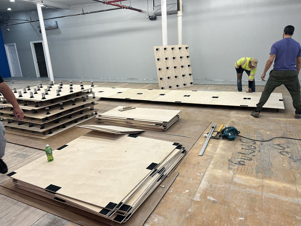 Installing the bottom layer of our spring floor