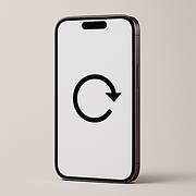 iPhone 14 Pro connected to Mac running iTunes for full software restore