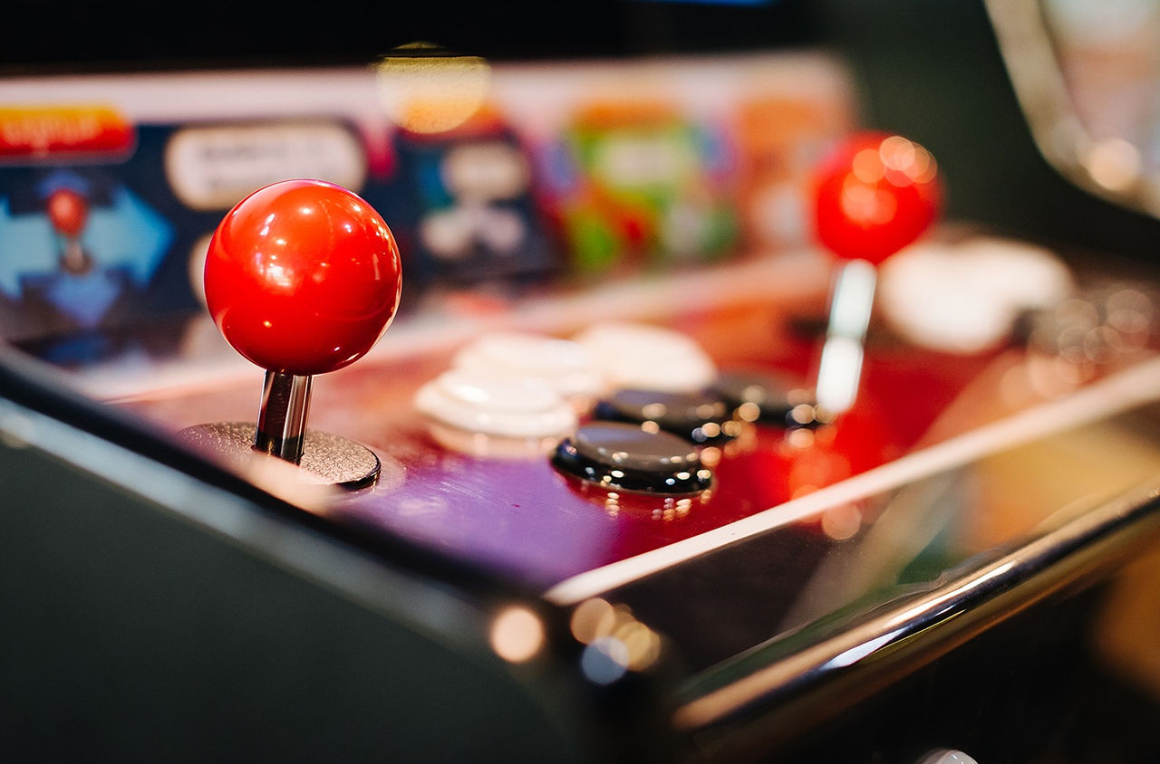 a blurred out arcade machine background