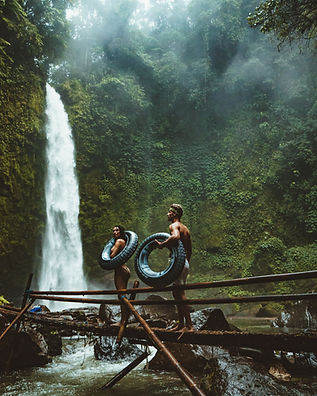 Couple by Waterfall