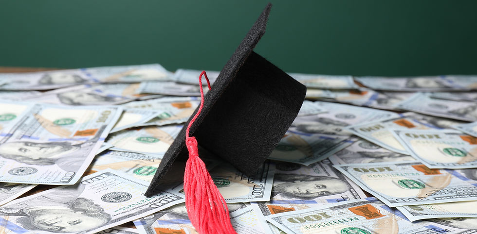 Graduate hat on dollar banknotes, closeup_edited.jpg