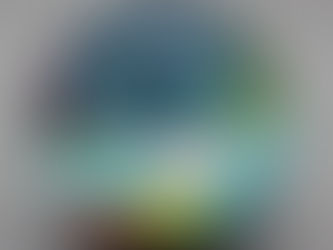 A resin sphere with embedded textural embroidery