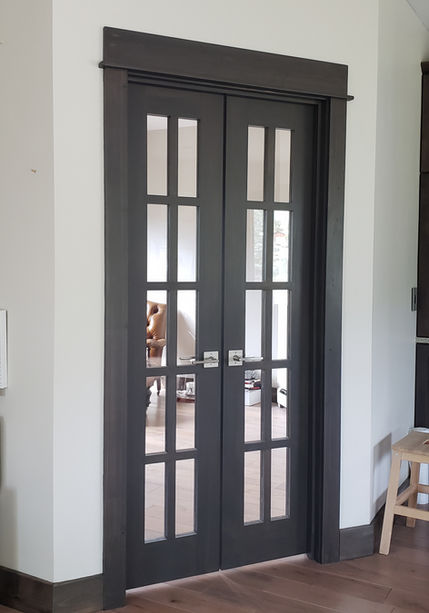 Created a new wall to enclose the office with french doors added for privacy. Remodeler Handyman Bozeman Montana On HIS Mark Services