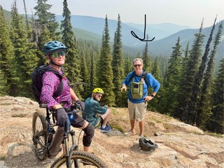 Dr. Julie Sowa biking with her family