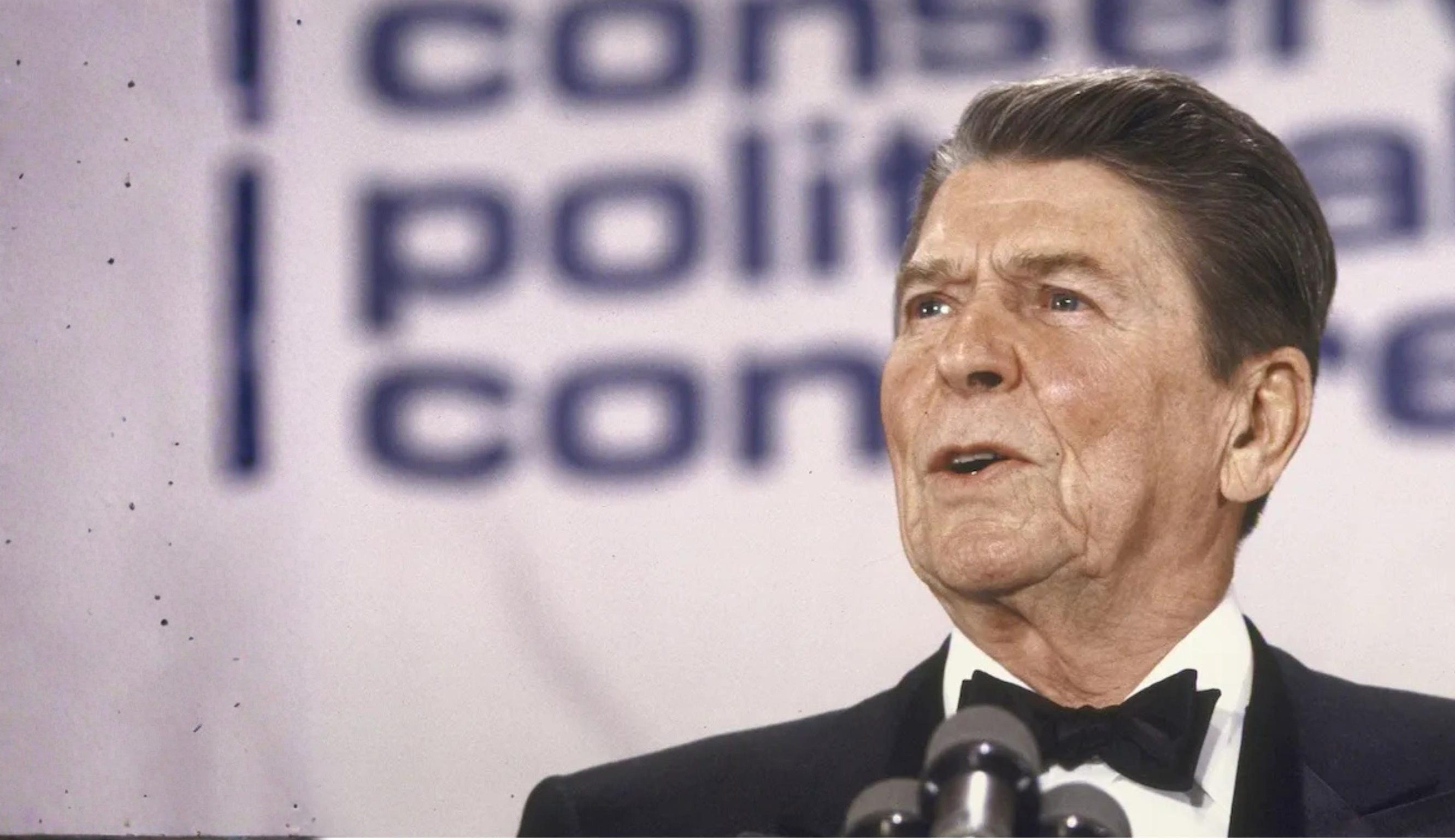Ronald Reagan in a tuxedo speaking at a Conservative Political Action Conference