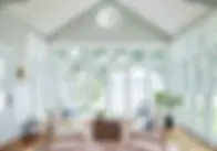 Sunroom with white windows