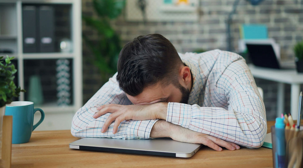 Man looking stressed at work
