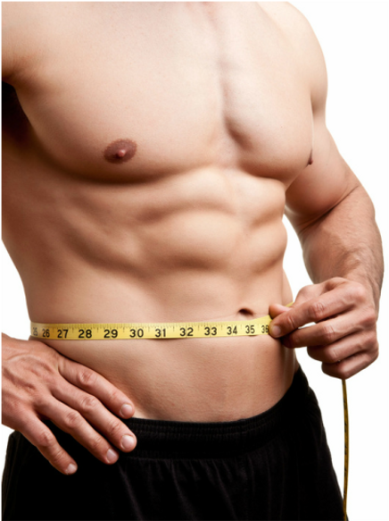 Bodybuilder measuring slim waist