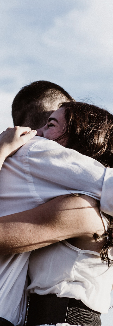 Young Lovers Hug After Pre-Marital Counseling