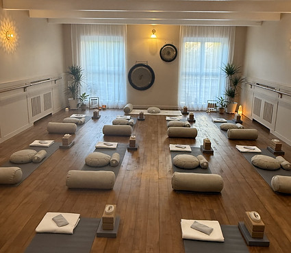 Yogi Sanctuary studio laid out with mats and props ready for a class.