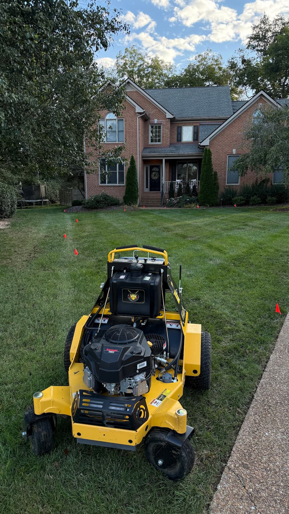 Core aeration and overseeding work on a Williamson County lawn