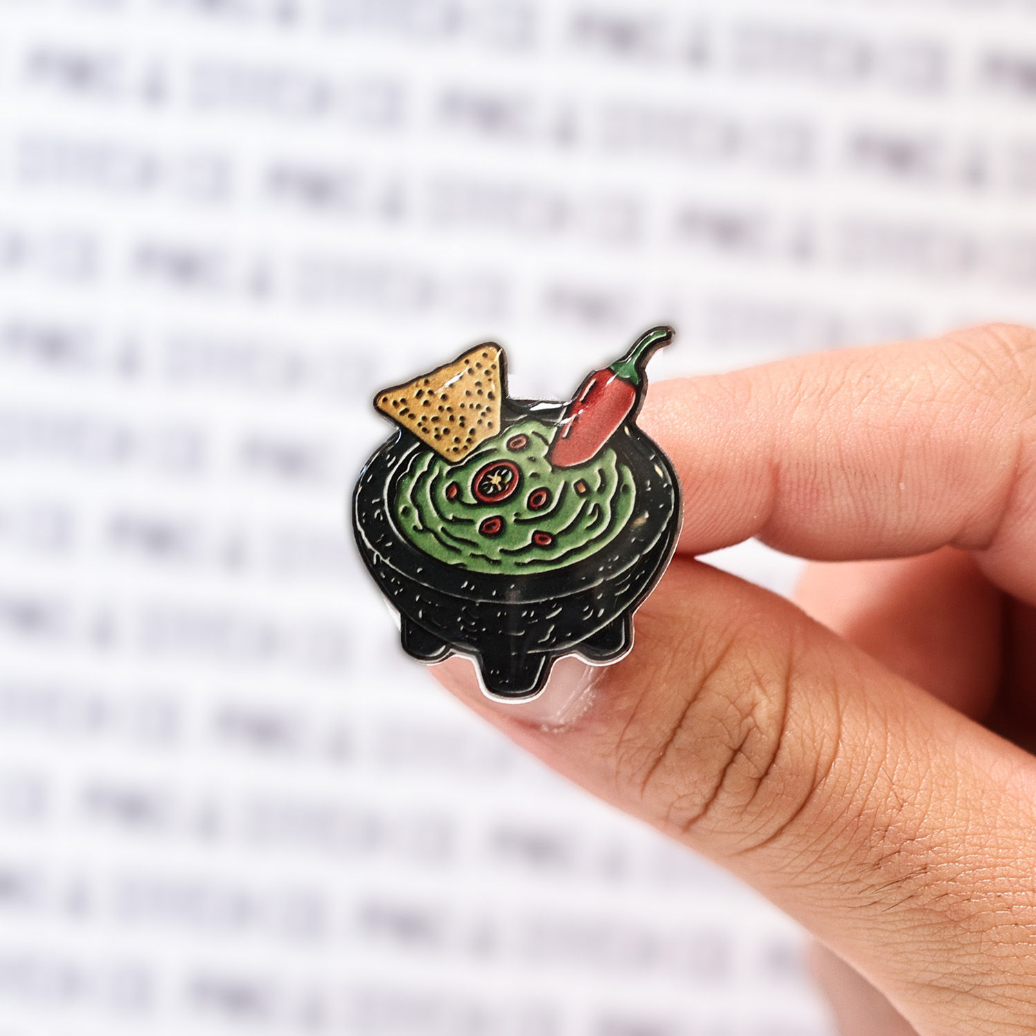 UV Resin Pin 'Guacamole': A detailed design featuring guacamole with a tortilla chip and a red pepper.