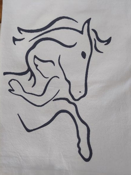 A line drawing of a woman with long hair hugging her horse. The horse is hugging her back with one leg and a lowered head.