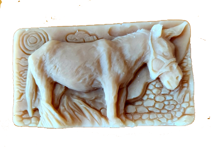 a donkey relief on a goat milk soap 