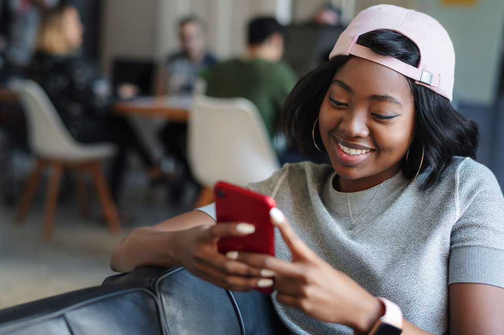Girl holding phone with red phone case