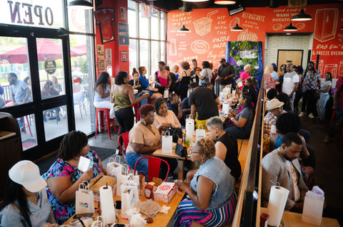 Garth Media organizing a corporate networking event with branded visuals