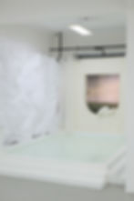 An indoor pool area with interchangeable backdrops