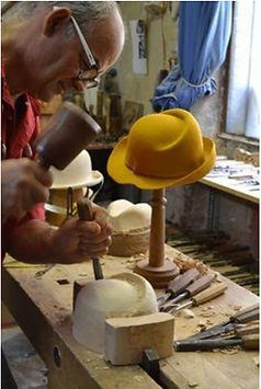 How to choose a hat for a woman - man making a hat