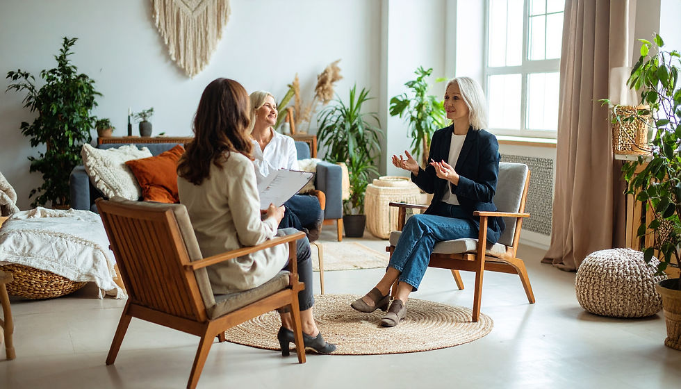 Firefly_Two women in a therapy session, seated in a cozy boho chic room filled with natura