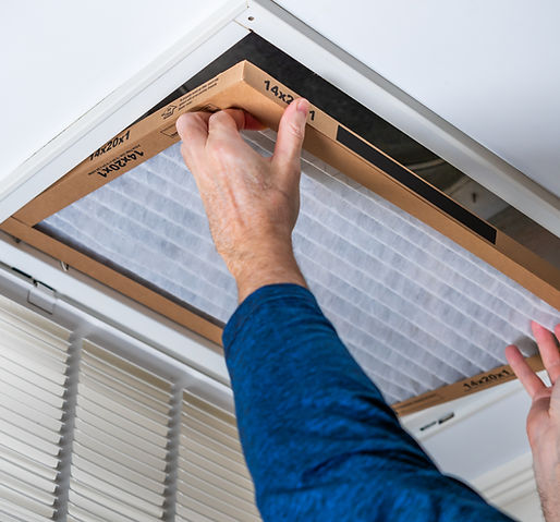 Handyman replacing HVAC filter is just one service included of MasterCare’s annual maintenance plan