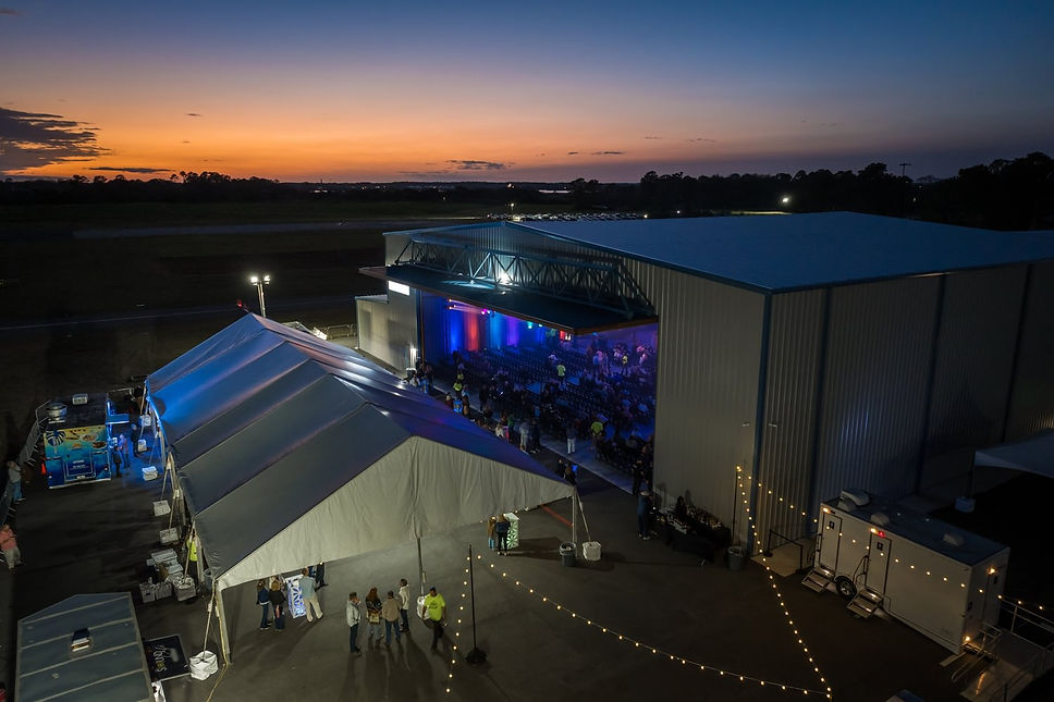 sunset over hangar and tent.jpg