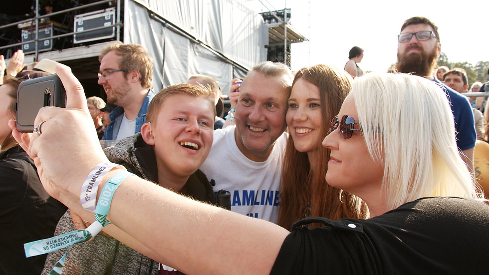 a group of people taking a photo at a charity event