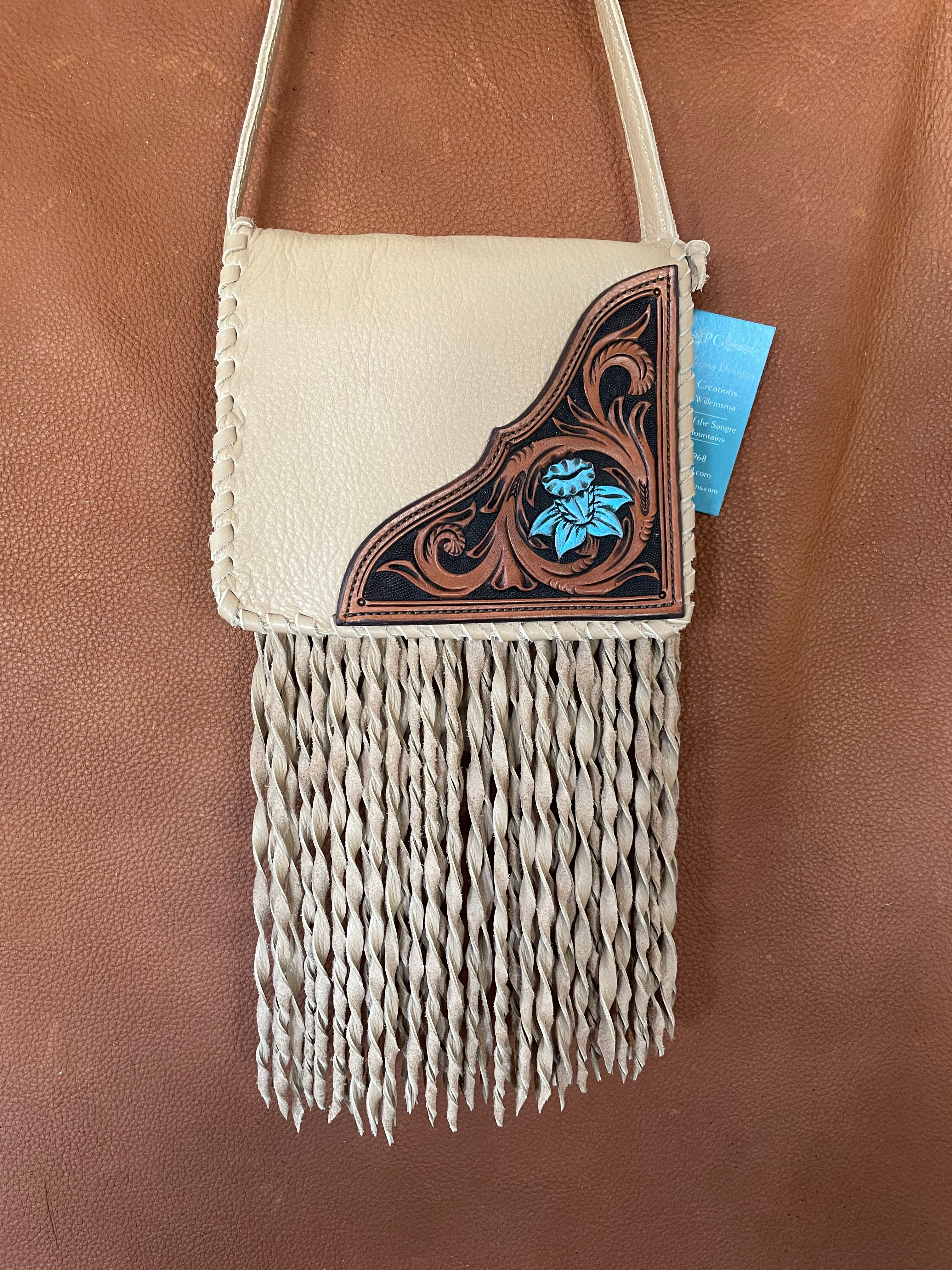 #79 Buckskin purse with handtooled flower