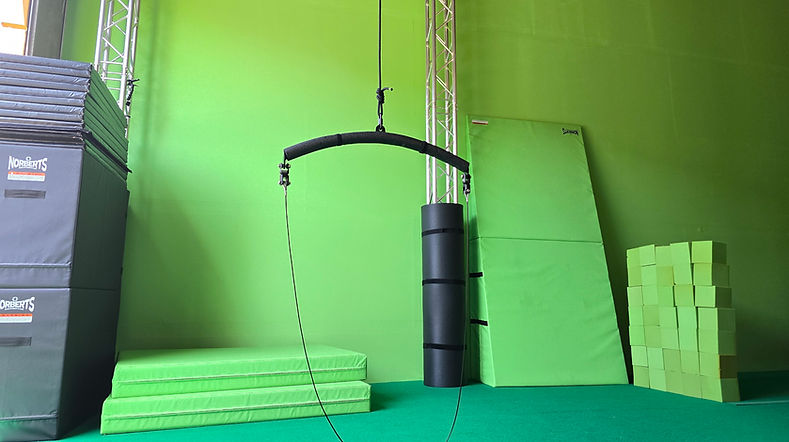 Green screen stage with mats and truss
