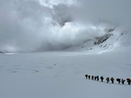 Porters crossing Hispar La during an expedition