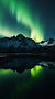 vecteezy_beautiful-northern-lights-above-mountain-and-river_24954768.jpg