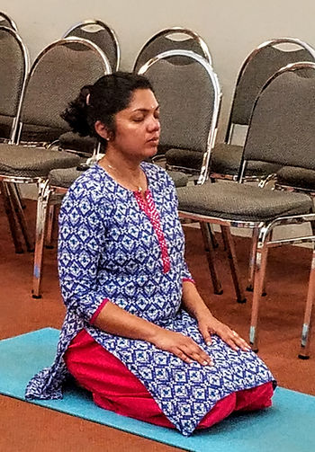 Chinmaya yoga student in Vajrasana