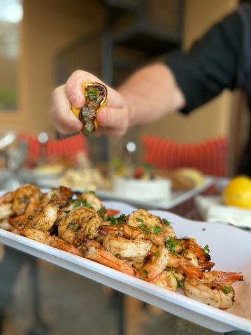 Shrimp dish prepared by Chef Turner, beautifully plated seafood entrée with fresh ingredients and elegant presentation.
