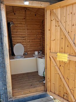 Composting toilet with door open.jpeg
