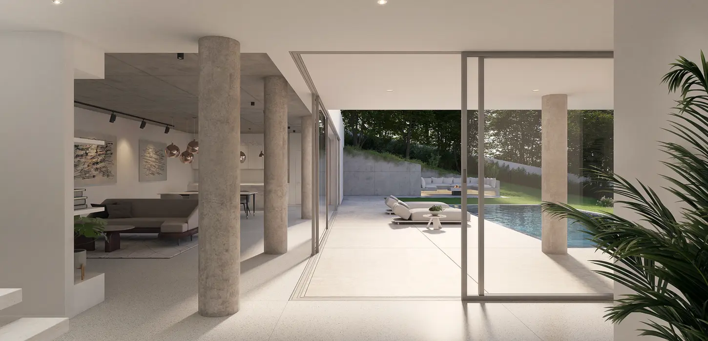 Interior living space at House M by Qloop Architects, connecting indoor and outdoor volumes.