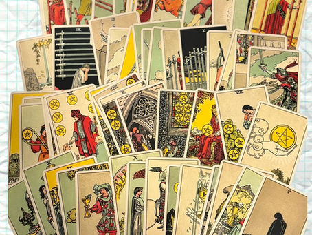 Minor Arcana Tarot cards — Wands, Cups, Swords, and Pentacles.