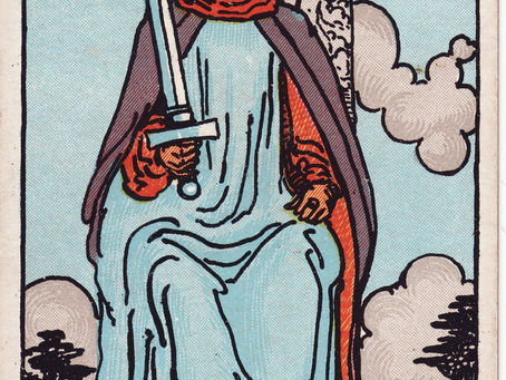 King of Swords Tarot card — authority, intellect, fairness, air energy.