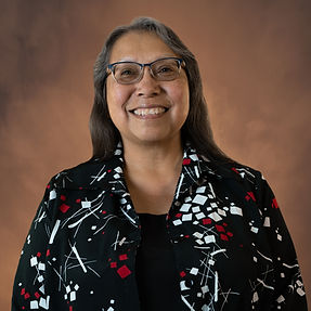 a photo of IHCRC's CFO, Deanna Holman, wearing a black shirt