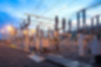 Electric substation illuminated at dusk.jpg