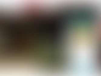 Outdoor burger stand with "Order Here" sign, surrounded by plants. Nearby, a phone screen displays the Driftscape digital tourism app showcasing a local business.