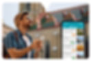 Man in straw hat and sunglasses looks up while holding a phone. The Driftscape app visitor experience platform is displayed on his phone.